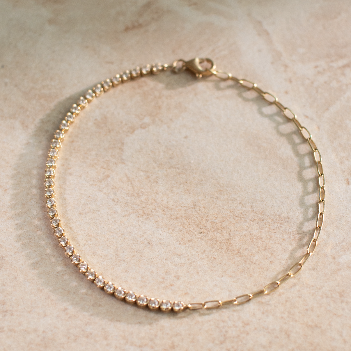 Half tennis and paperclip chain bracelet