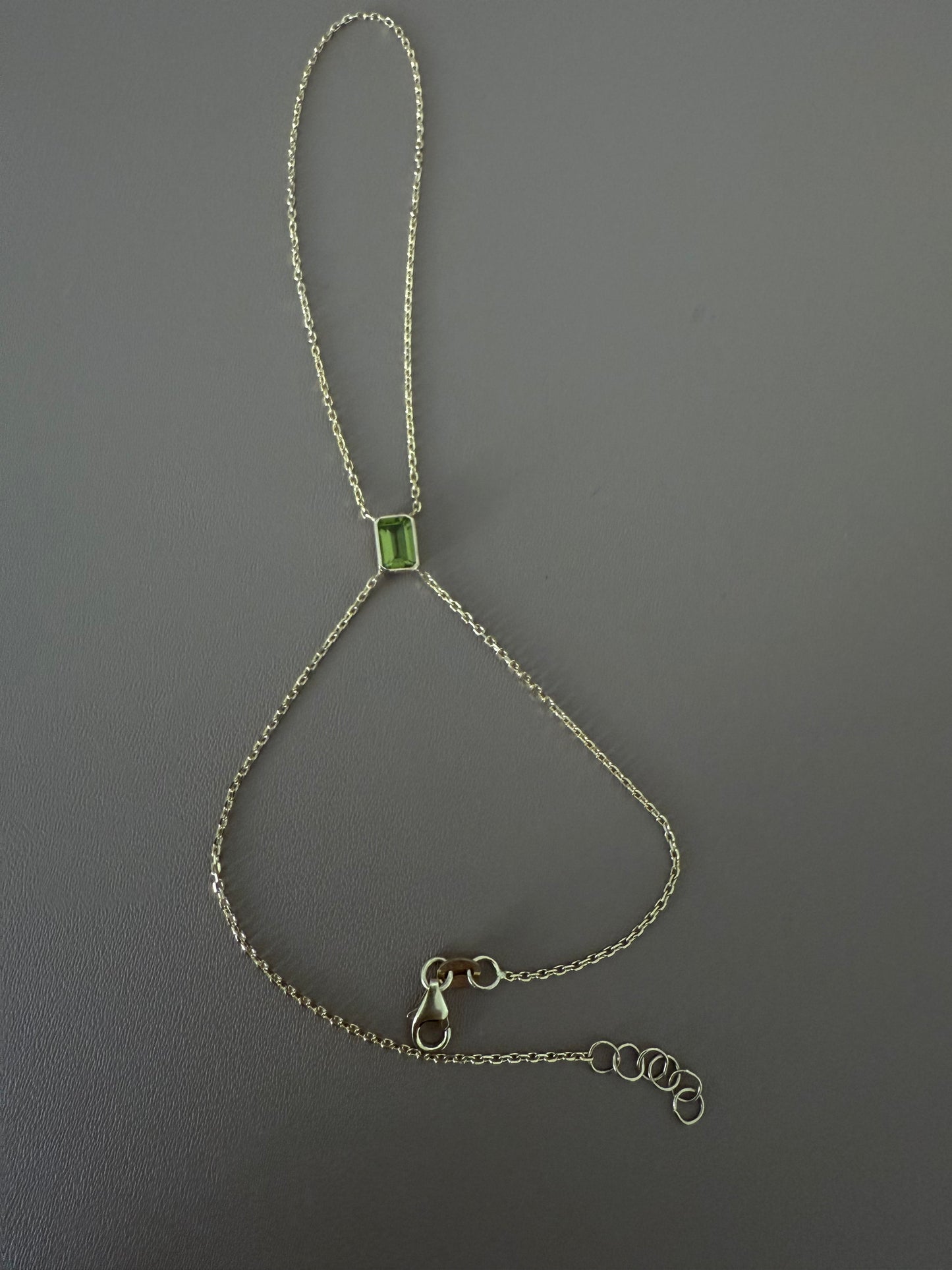 Bezeled stone handchain